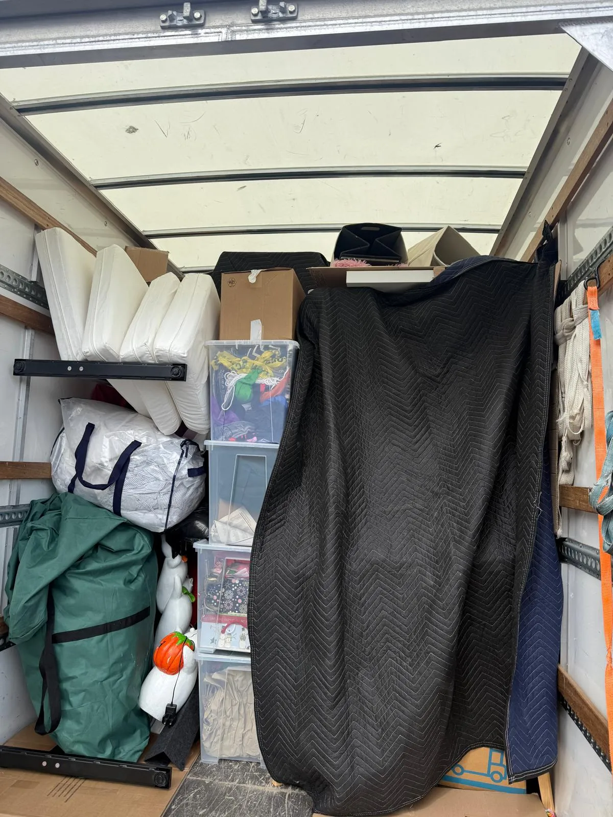 Household goods packed inside a removal van